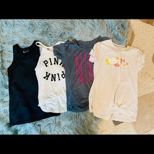 Lot of workout clothes. Nike, Adidas, under armour and Pink